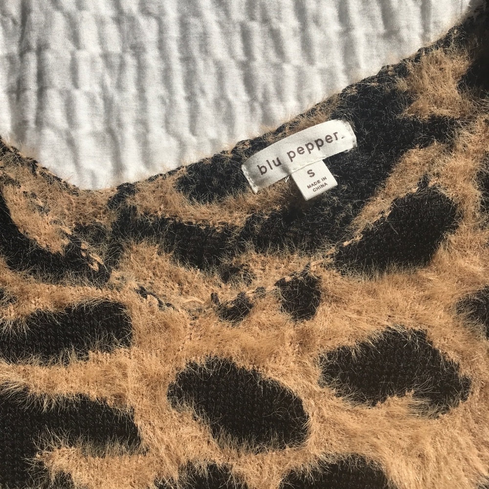 Super soft cheetah sweater. Never worn! Size small